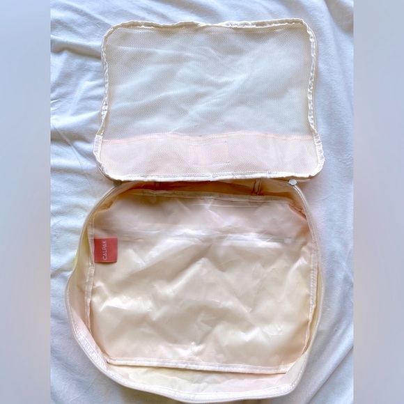 Calpak Peach and Yellow Mesh Travel Bag - Picture 7 of 11